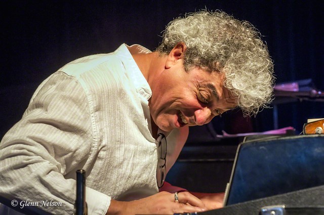 Jovino Santos Neto goes for a little umph on the keyboards.