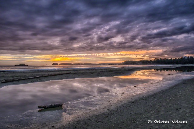 The sun sets on Chesterman Beach on our final night there.