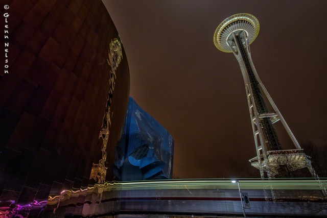 The Space Needle and the Monorail reflect on the EMP.